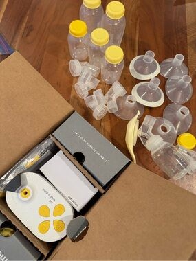 Medela Pump In Style Pro Box with Yellow and Clear Accessories